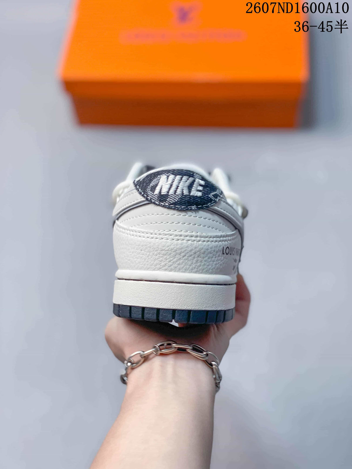 Nike SB Dunk Low White and Navy Low-Top Sneakers