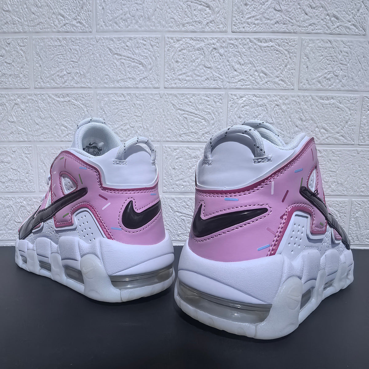 Nike Air More Uptempo Donut Sneakers in White and Pink