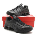 Nike Shox R4 All-Black Embossed Sneakers