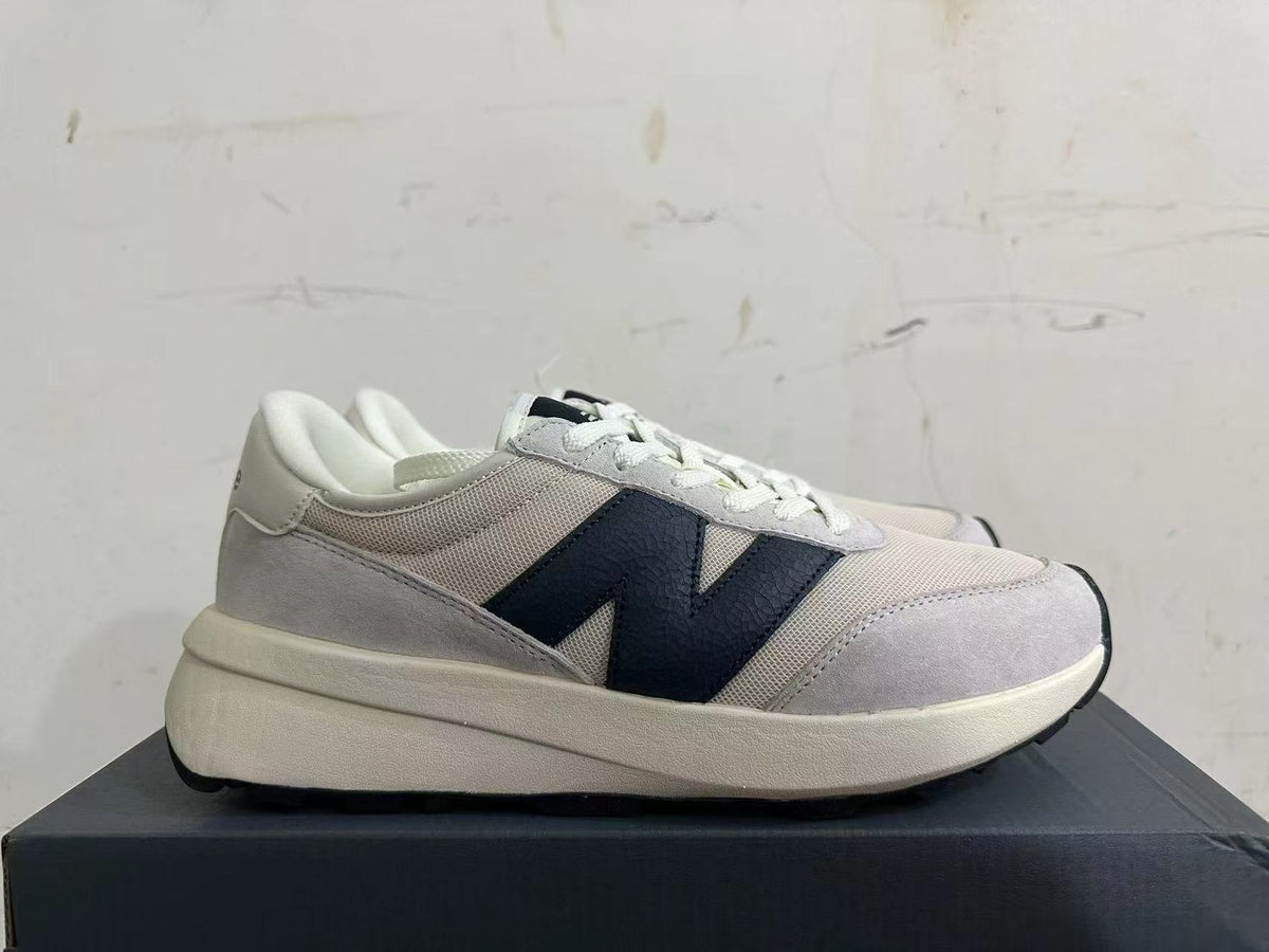 New Balance U370 Sneakers in Gray and Navy